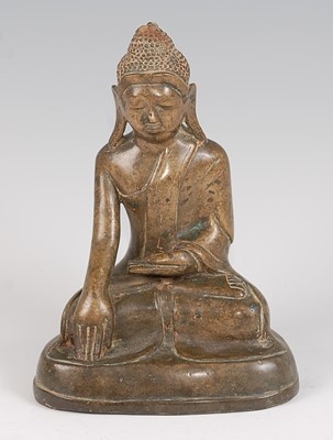 Lot 1367 - A 19th century Indian bronze Buddha in...