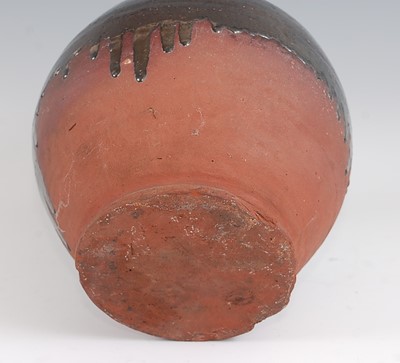 Lot 1033 - An early 19th century earthenware bellamine...