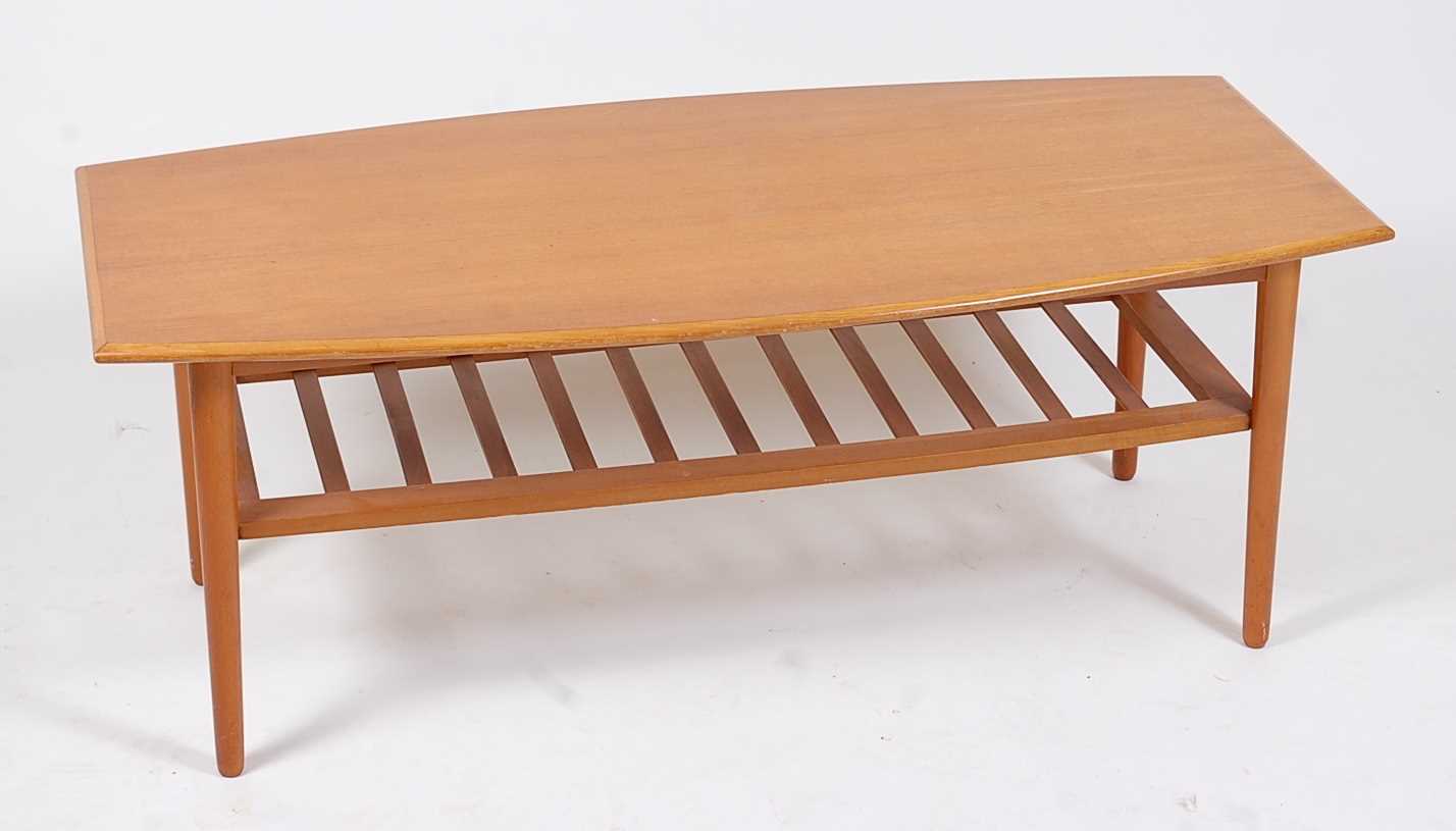 Lot 327 - A 1960s teak low coffee table, having bowed...