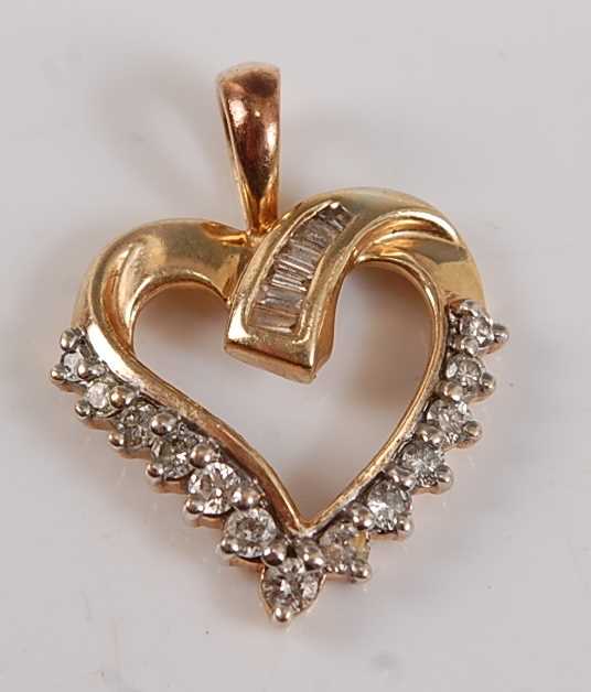 Lot 2648 - A yellow metal openwork diamond heart pendant,...