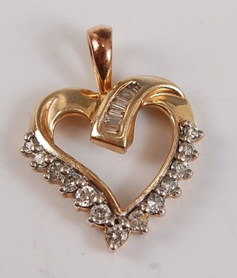 Lot 2648 - A yellow metal openwork diamond heart pendant,...