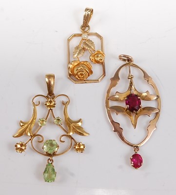 Lot 2652 - Three yellow metal pendants,  comprising; an...