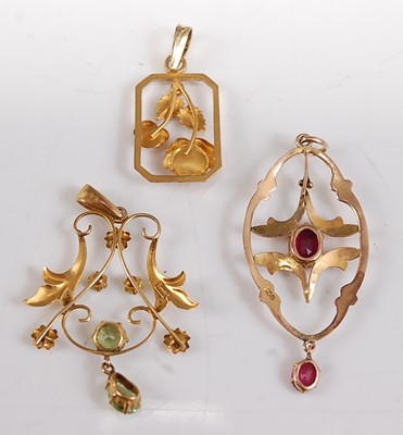 Lot 2652 - Three yellow metal pendants, comprising; an...