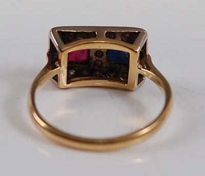 Lot 2678 - A yellow metal, ruby and sapphire rectangular...