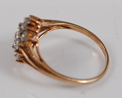 Lot 2681 - A 9ct yellow gold diamond oblong cluster ring,...