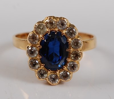 Lot 2670 - A yellow metal synthetic sapphire oval cluster...