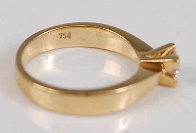 Lot 2597 - A yellow metal diamond single stone ring,...