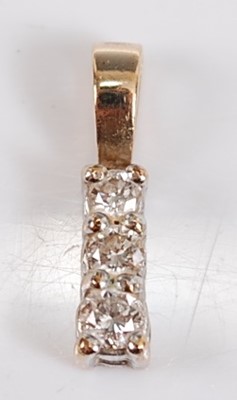 Lot 2605 - A 9ct yellow gold diamond pendant, comprising...