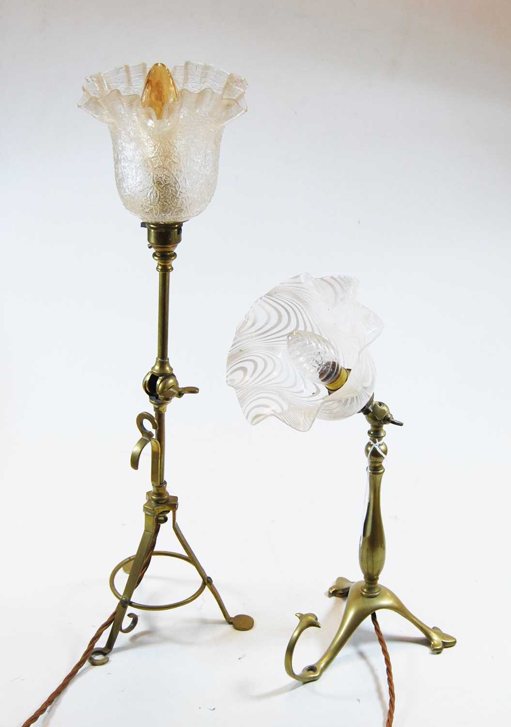 Lot 1 - An Edwardian adjustable brass table lamp, the...