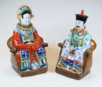 Lot 42 - A pair of 20th century Chinese pottery figures...