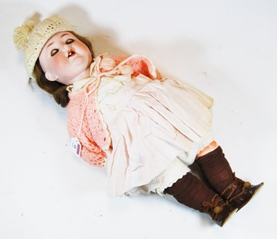 Lot 44 - A 20th century German bisque headed doll,...