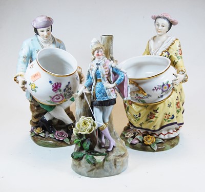 Lot 50 - A pair of 20th century pottery figures of a...