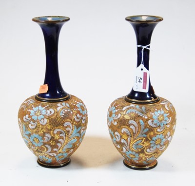 Lot 54 - A pair of Royal Doulton stoneware bottle vases,...