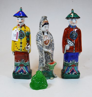Lot 55 - A pair of 20th century Chinese pottery figures...