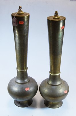 Lot 118 - A pair of large Eastern brass table lamps,...