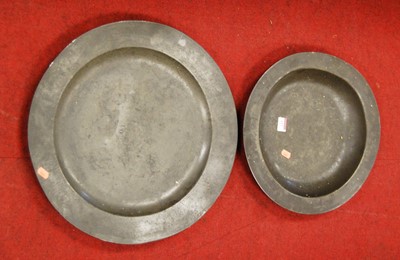 Lot 127 - A large 19th century pewter charger, of plain...