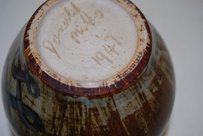 Lot 193 - A Donald Mills studio stoneware jug, signed...