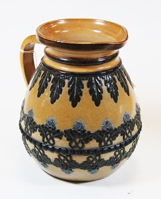 Lot 195 - A Doulton Lambeth stoneware jug having...