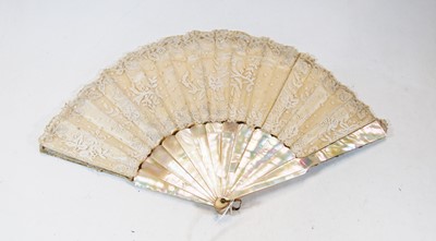 Lot 221 - A Victorian mother of pearl and silk ladies...