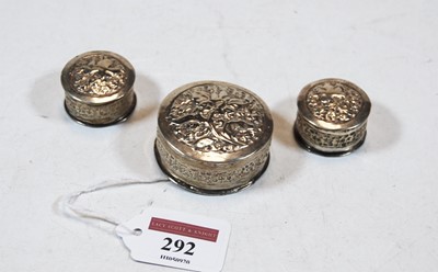 Lot 292 - An early 20th century Eastern white metal pill...
