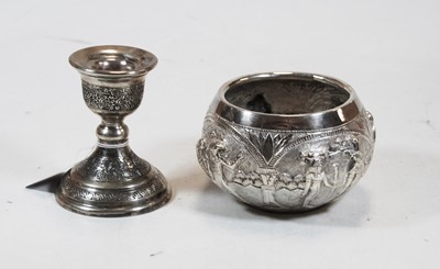 Lot 256 - A Middle Eastern white metal dwarf candlestick;...