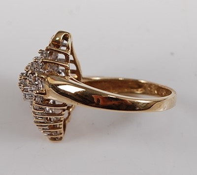 Lot 2580 - A 9ct yellow gold diamond marquise shaped...