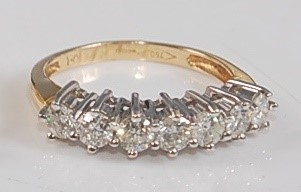 Lot 2589 - An 18ct yellow and white gold diamond...