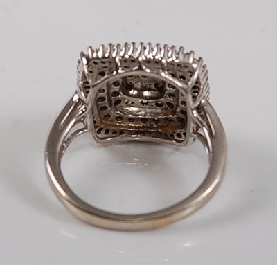 Lot 2586 - A 9ct white gold diamond square cluster ring,...