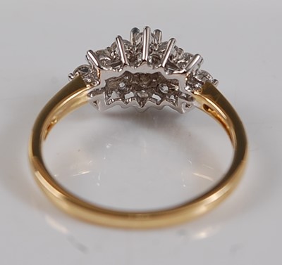Lot 2587 - An 18ct yellow and white gold diamond oblong...