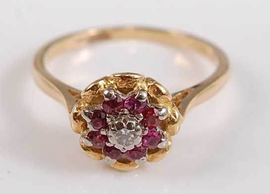 Lot 2512 - A yellow and white metal, ruby and diamond...