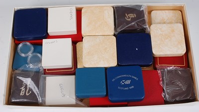 Lot 2073 - A collection of various (empty) coin cases...