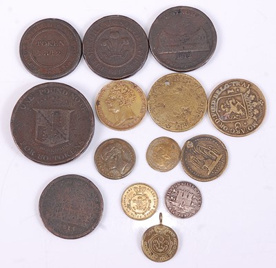 Lot 2129 - A collection of tokens to include 1812...