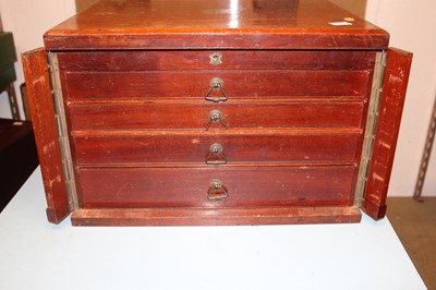 Lot 118 - Non Meccano dark stained four drawer cabinet...