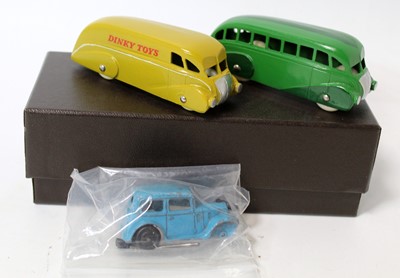 Lot 725 - One original and two reproduction Dinky Toys:...