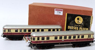 Lot 770 - Trix Twin diesel flyer 2-coach unit, red and...