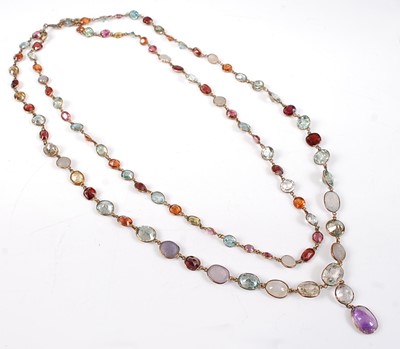 Lot 2533 - A yellow metal two row multi-stone necklace,...