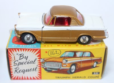 Lot 1626 - A Corgi Toys No. 231 Triumph Herald Coupe...