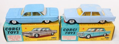 Lot 1648 - A Corgi Toys boxed saloon diecast group to...