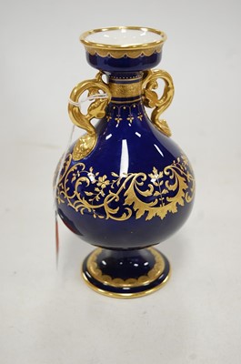 Lot 187 - A Mintons porcelain twin handled pedestal vase,...