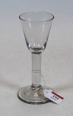 Lot 194 - A 19th century wine glass having funnel bowl...