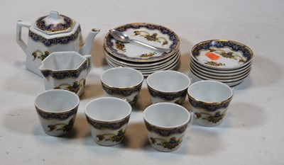 Lot 204 - A Staffordshire childs six place setting...