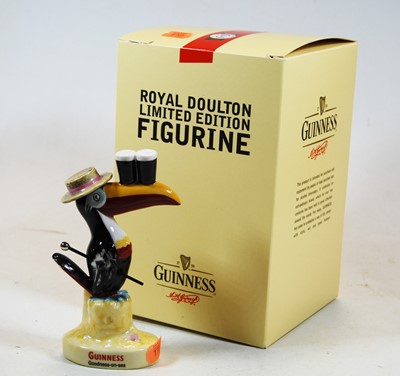 Lot 211 - A Royal Doulton seaside Toucan for Guinness,...