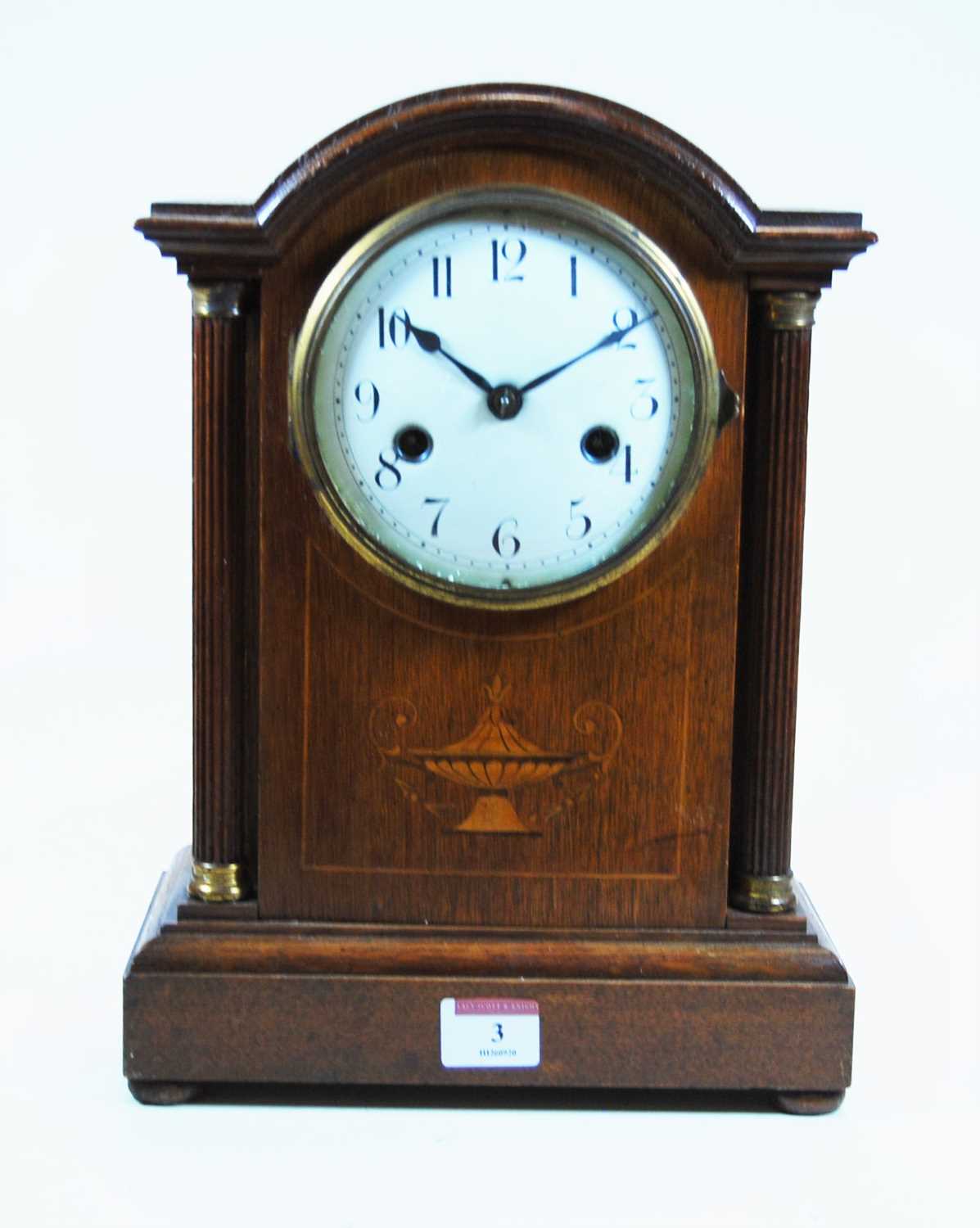 Lot 3 - An early 20th century oak cased mantel clock,...