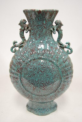 Lot 44 - A Chinese export turquoise glazed moon vase,...