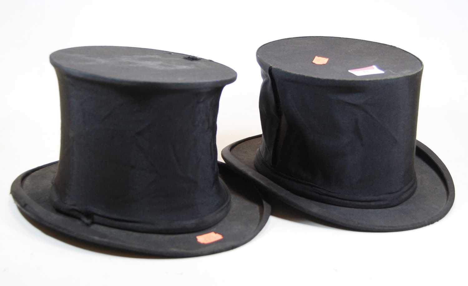 Lot 45 - A vintage black folding top hat, bearing label...