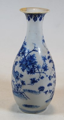 Lot 231 - A Chinese export blue and white vase (a/f),...