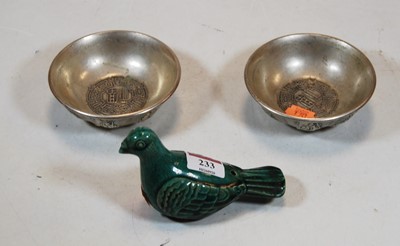 Lot 233 - A Chinese green glazed earthenware bird;...