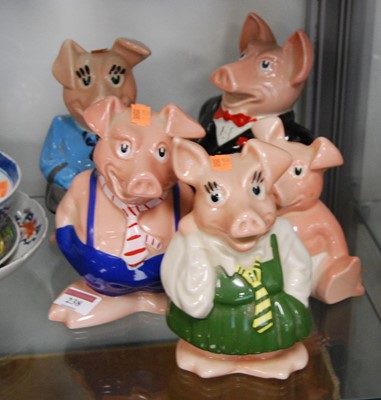 Lot 238 - A set of five Wade Natwest money-box pigs