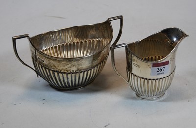 Lot 267 - A George V silver twin handled sugar bowl...