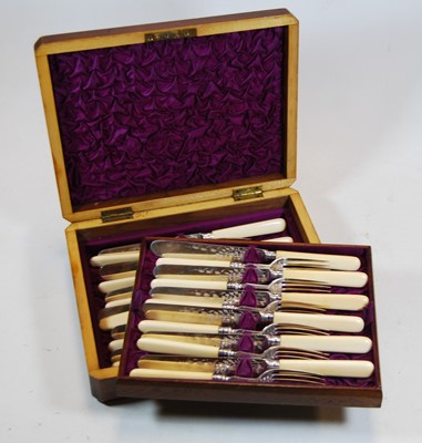 Lot 269 - A cased set of twelve Victorian silver plated...